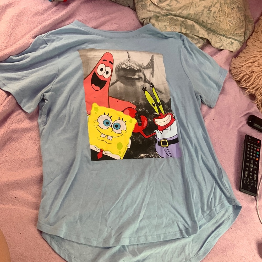 It’s a blue tee shirt that’s had a print on it
